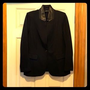 Faux leather detail blazer.